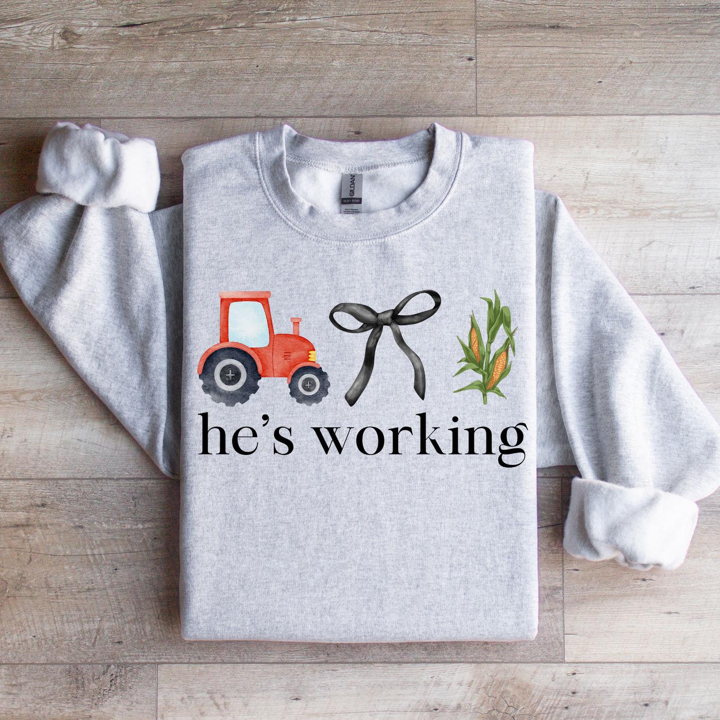 He's Working Graphic Tee