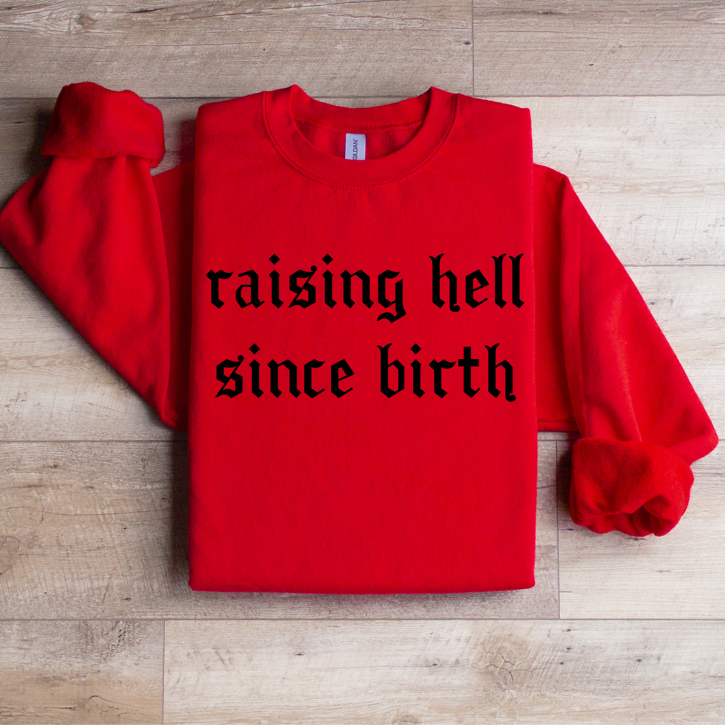 Raising Hell Since Birth Graphic Tee
