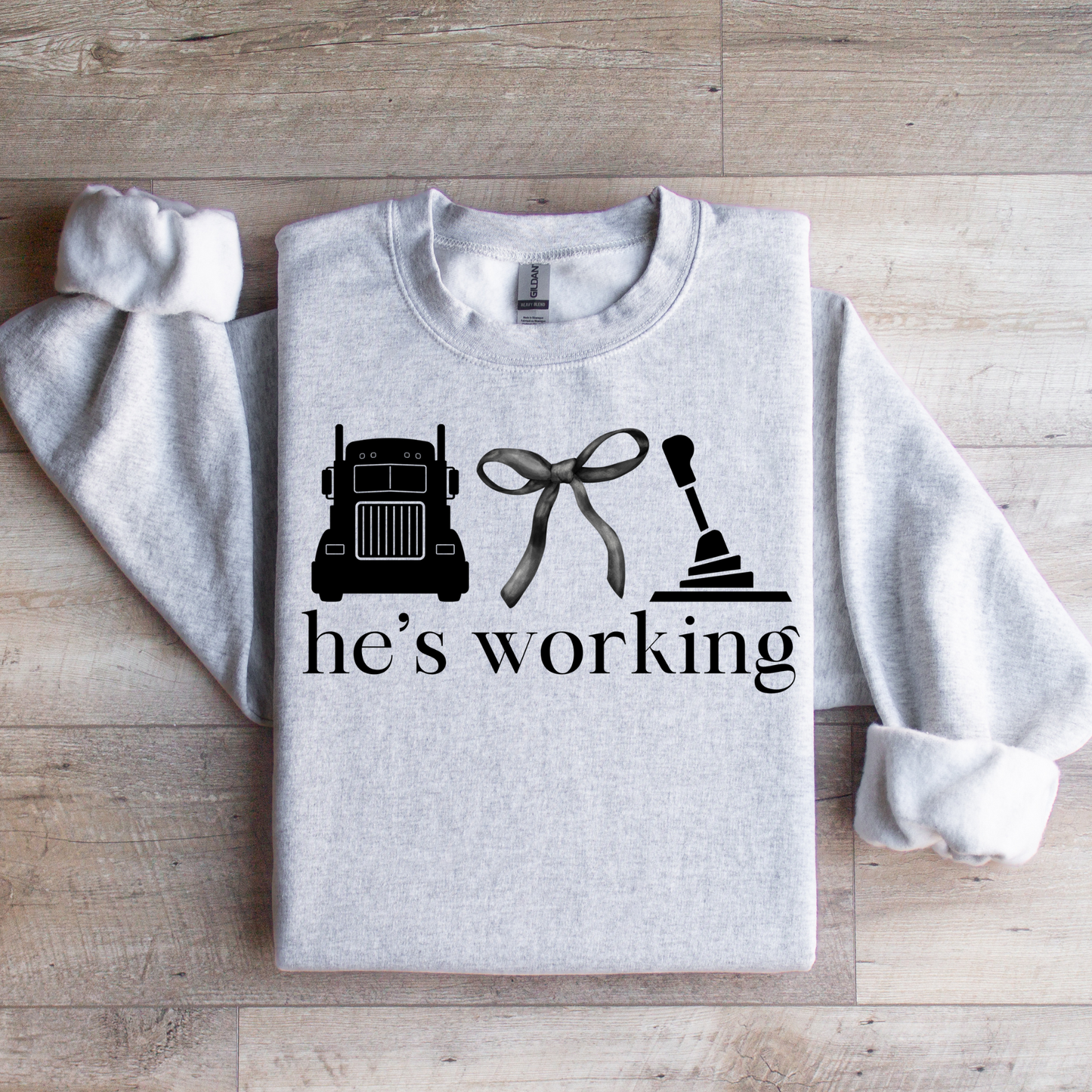 He's Working Graphic Tee
