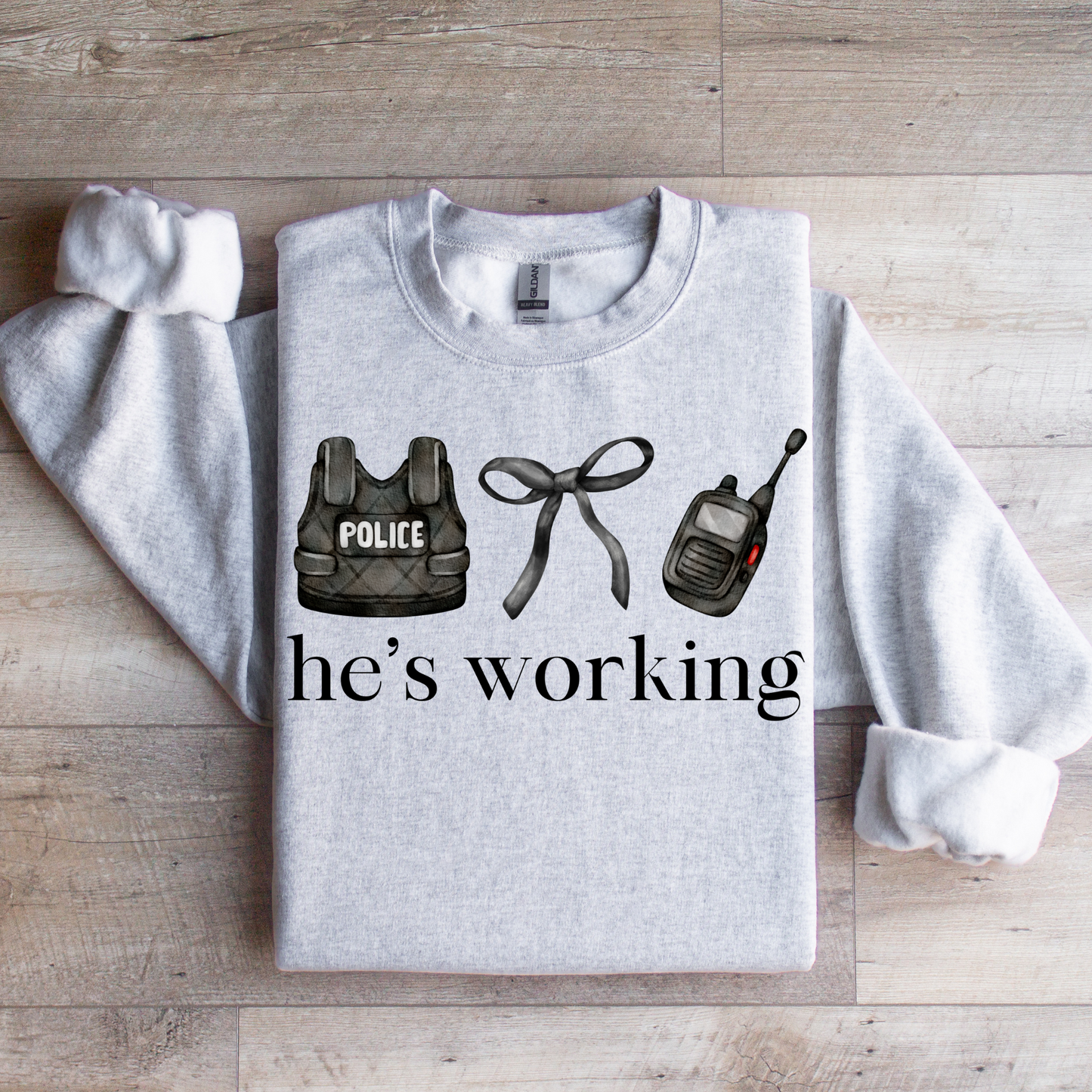 He's Working Graphic Tee