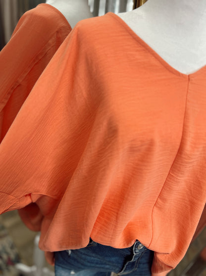 DOORBUSTER WOVEN V-NECK TOP - Coral