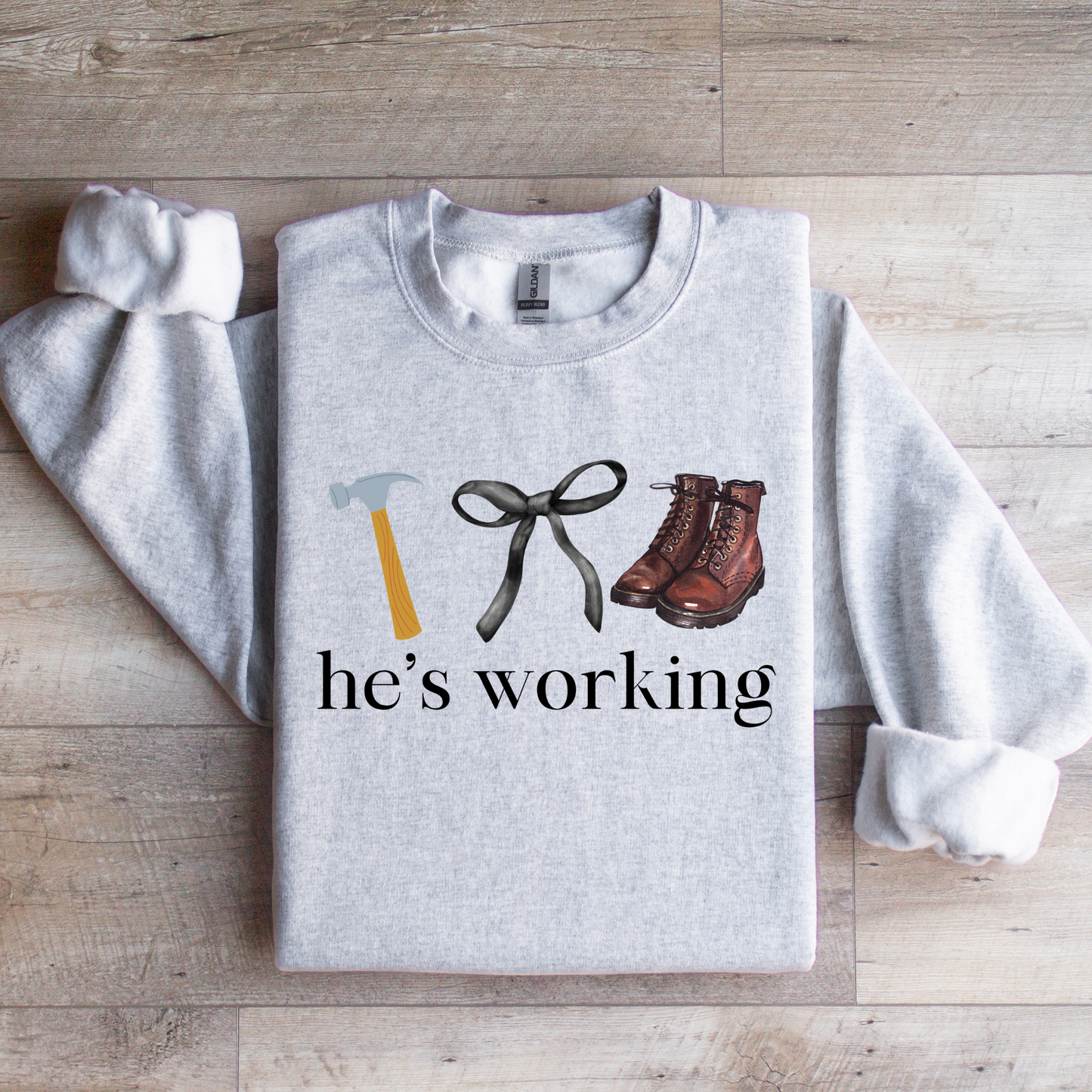 He's Working Graphic Tee