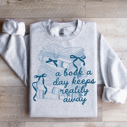 A Book A Day Keeps Reality Away Graphic Tee