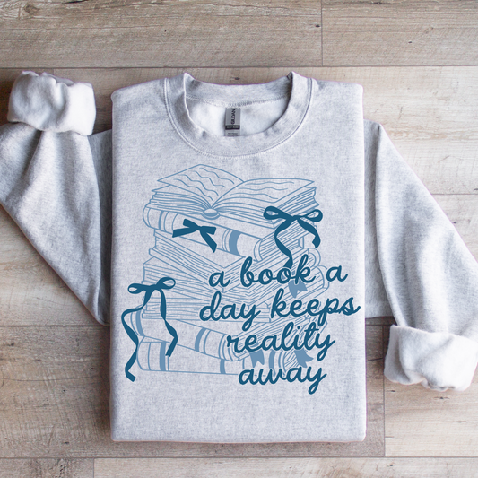 A Book A Day Keeps Reality Away Graphic Tee