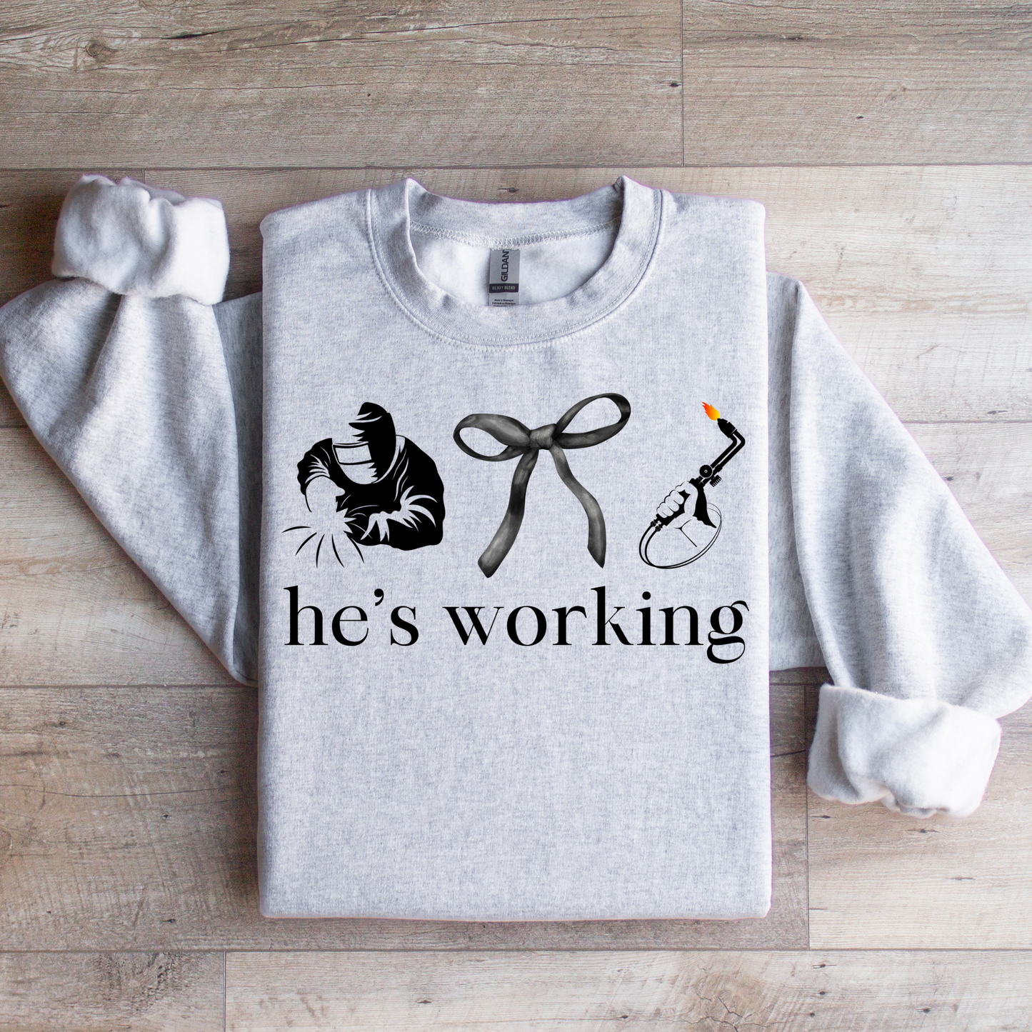 He's Working Graphic Tee