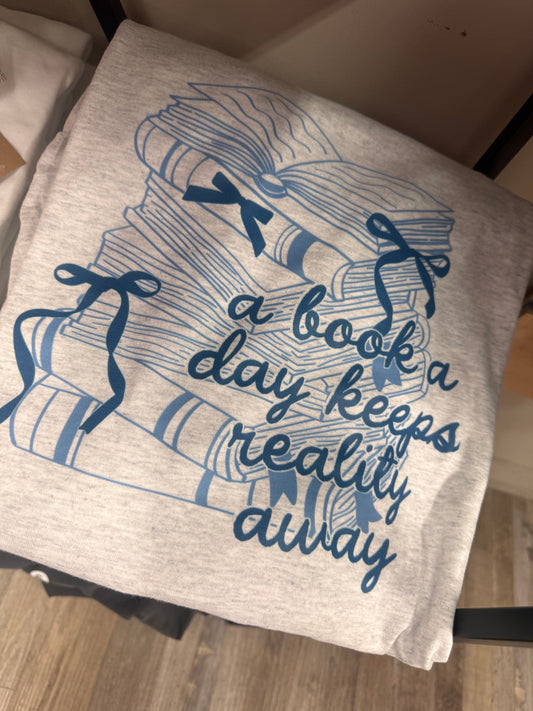 Graphic Tee Sale - Long Sleeve A Book a Day Keeps Reality Away