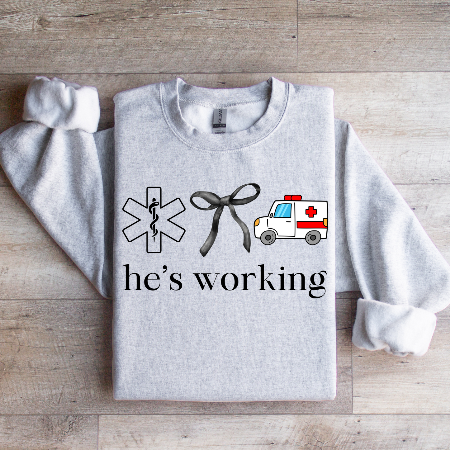 He's Working Graphic Tee