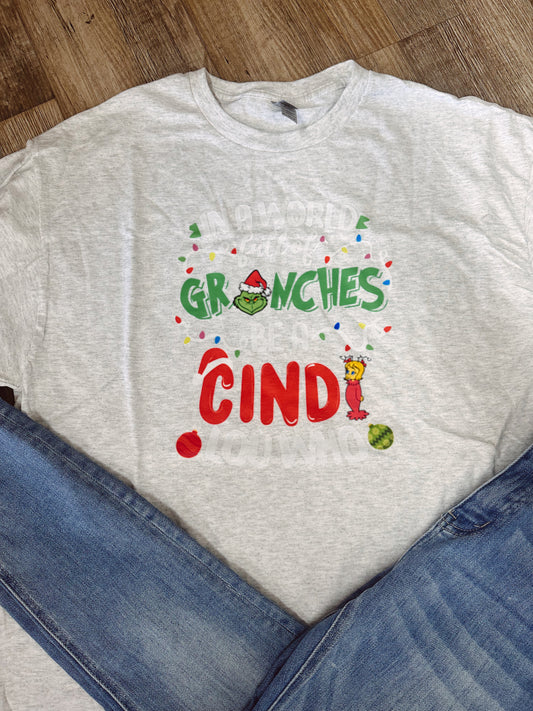 In A World Full Of Grinches Be A Cindi Lou Who Graphic Tee